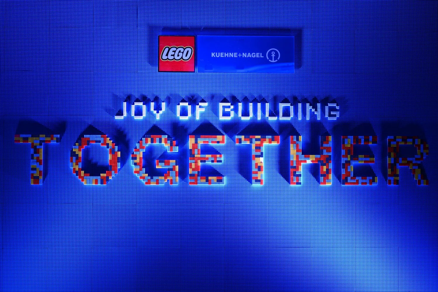 LEGO bricks showing "joy of building together" related to the inauguration of the new distribution centre in Vietnam.