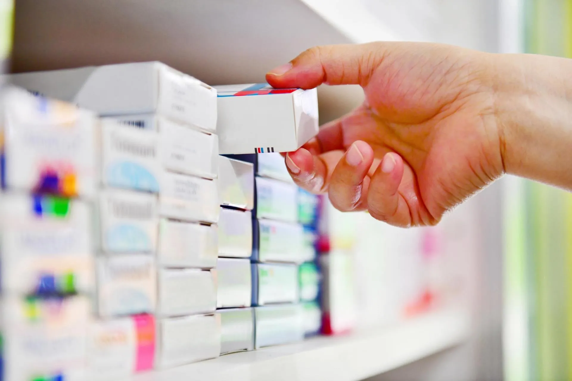 Stocking medicine boxes onto a shelf