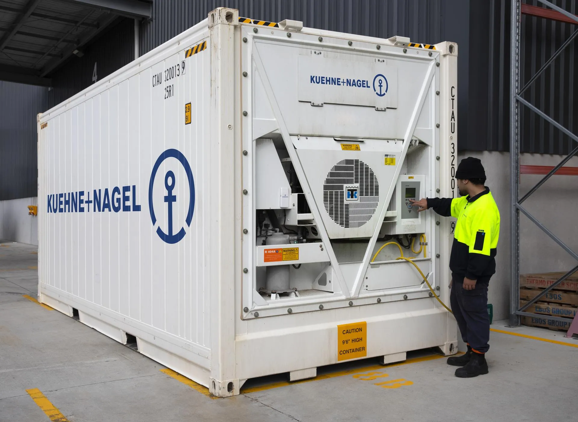 Technician conducting diagnostics on industrial equipment