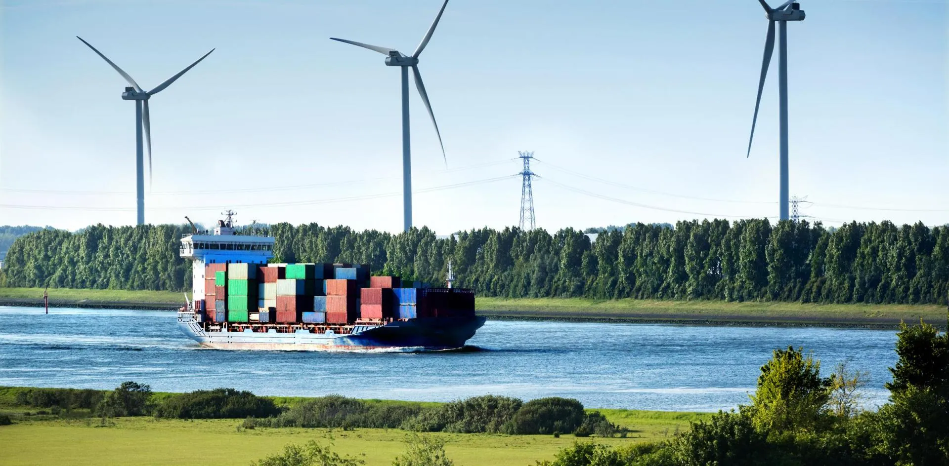 Container ship entering the seaport of Rotterdam