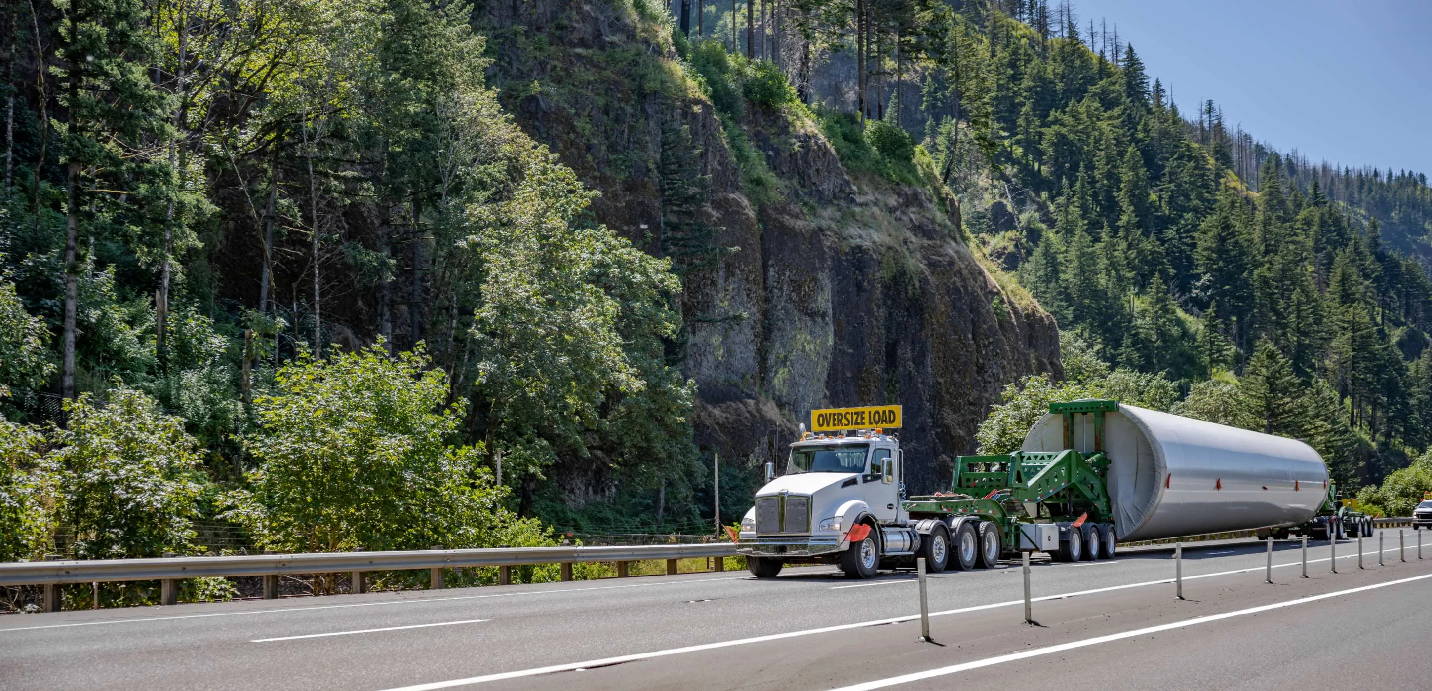 Transporting oversized windmill electric generator pole