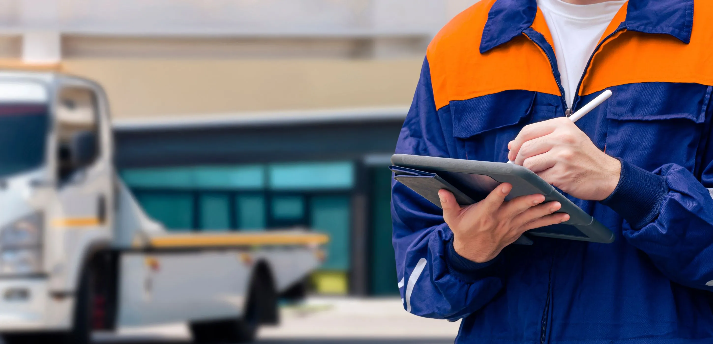 Customs officer using electronic pen to recording information