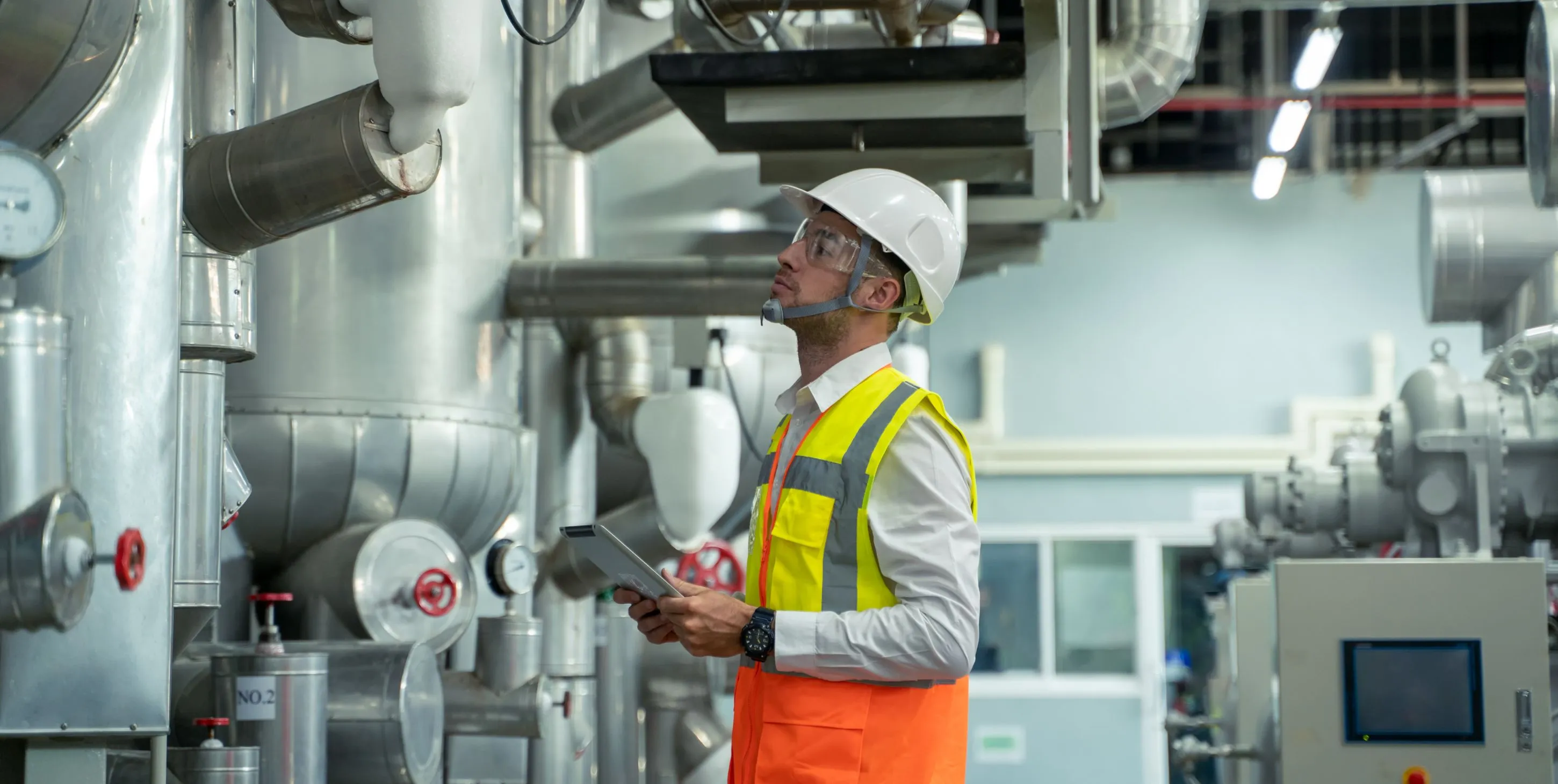 Engineer checking and maintenance technical data of system