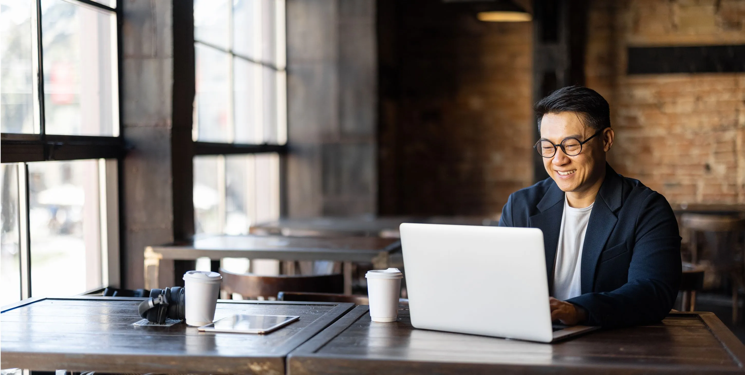 Businessman typing on laptop