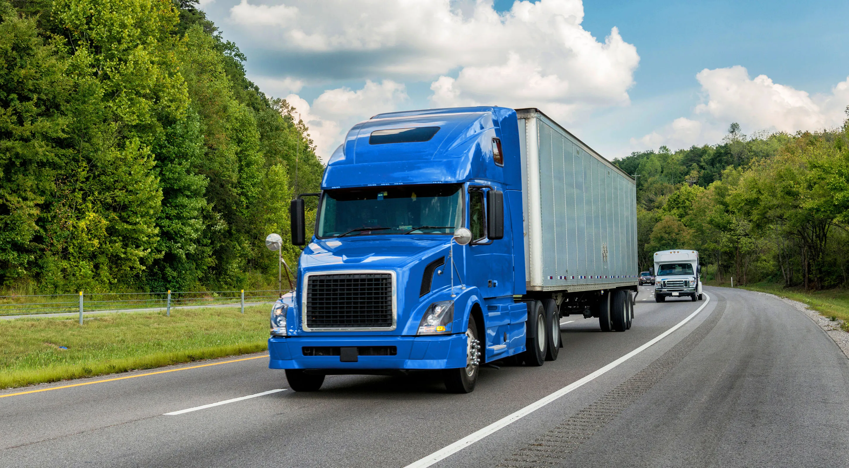 Blue truck for solution full truckload on the road