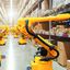 Robots packing the boxes in big warehouse