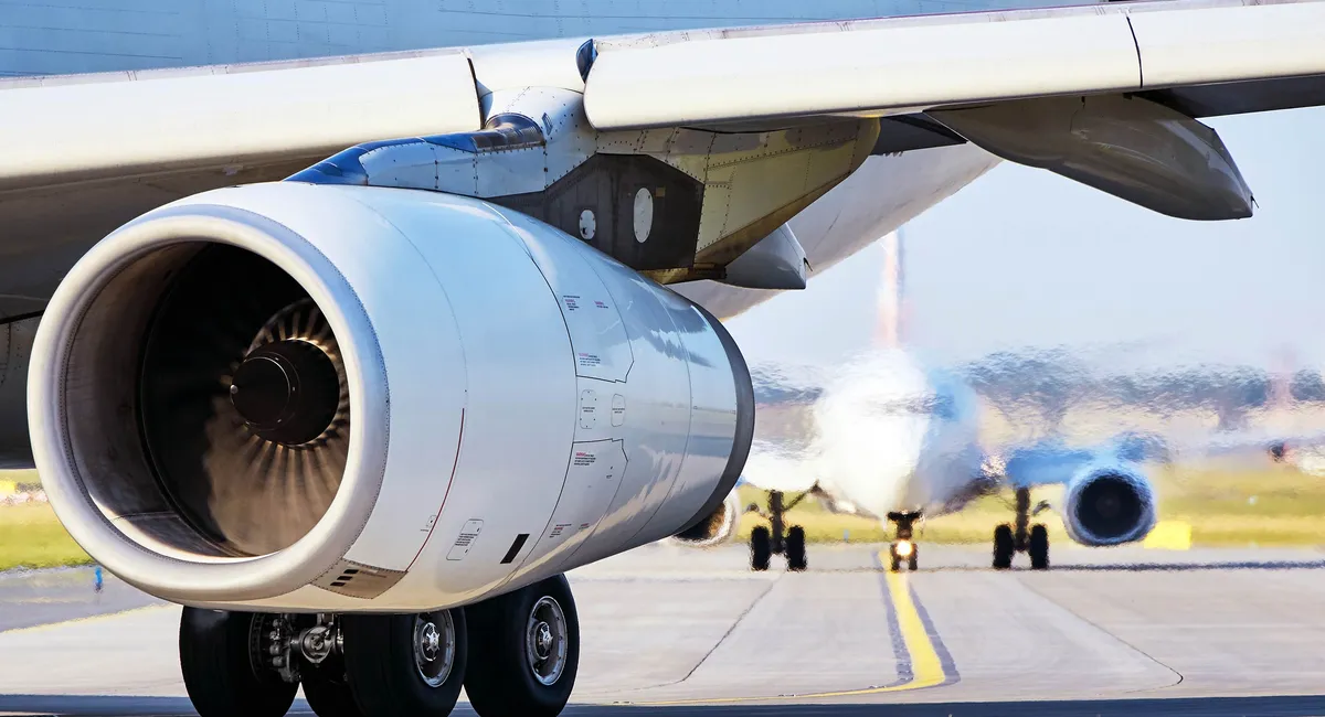 A close-up of a plane's turbine during takeoff
