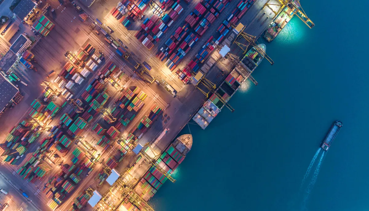Container ship in export and import business and logistics