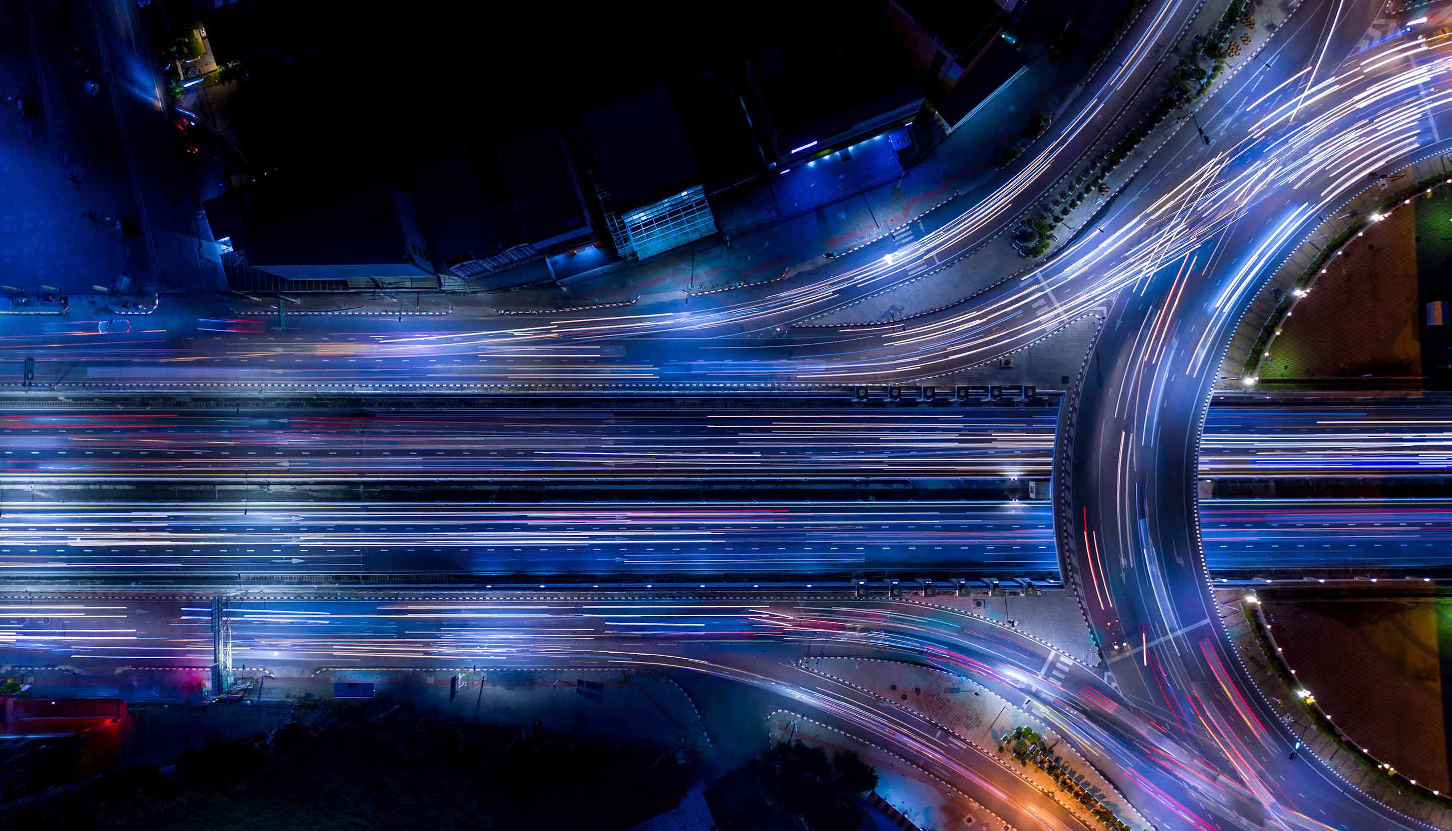 Aerial top view of a motorway at night
