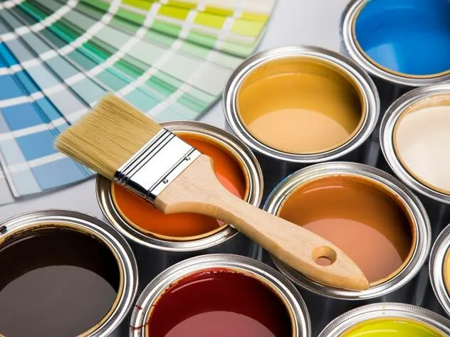 Open paint cans with brush and color palette
