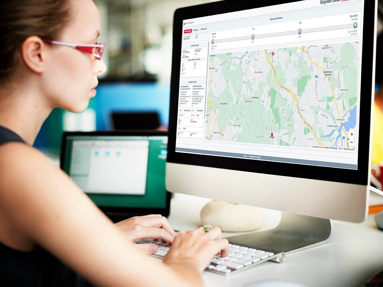 Women looking at Google maps on her PC