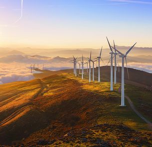 Beautiful landscape of a sunrise and wind turbines Beautiful landscape of a sunrise and wind turbines