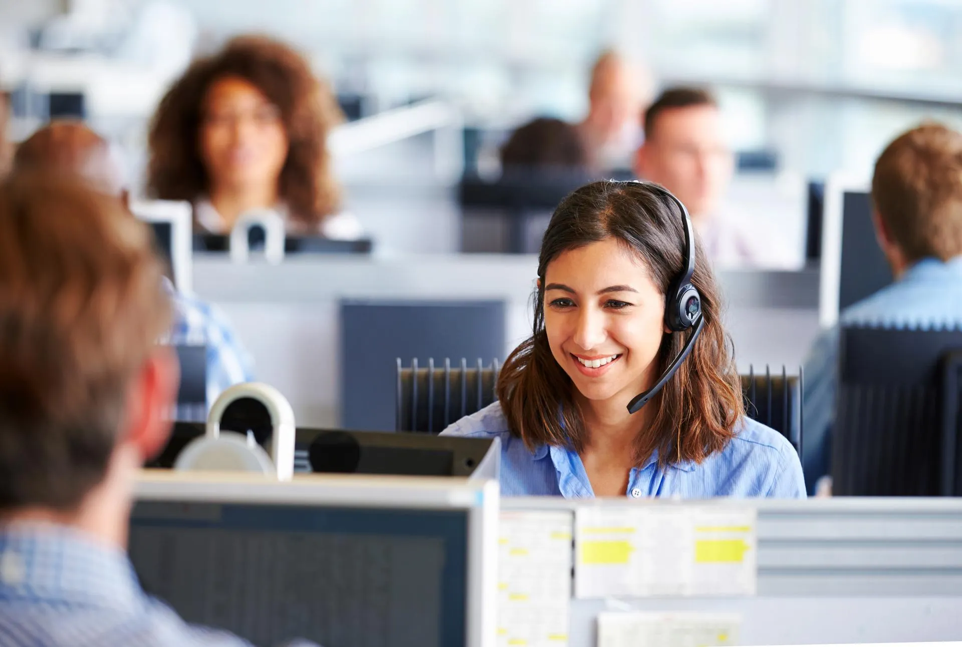 Women taking a call in the office