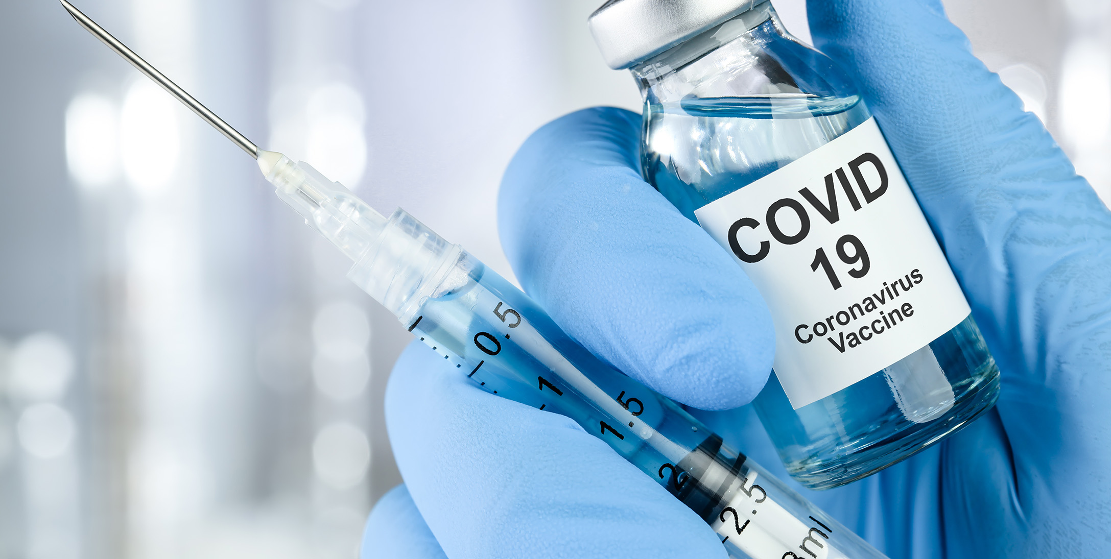 Covid-19 vaccine bottle and medical certificate