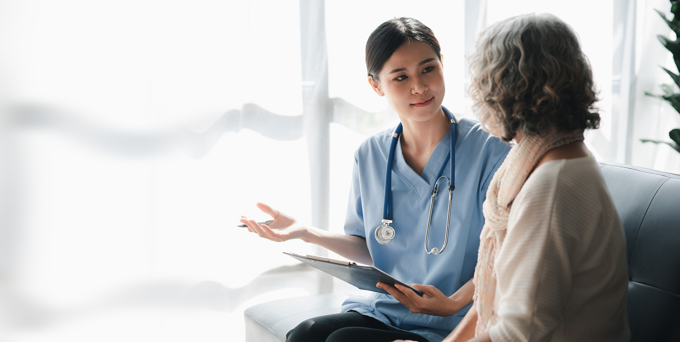 nurse and patient talking