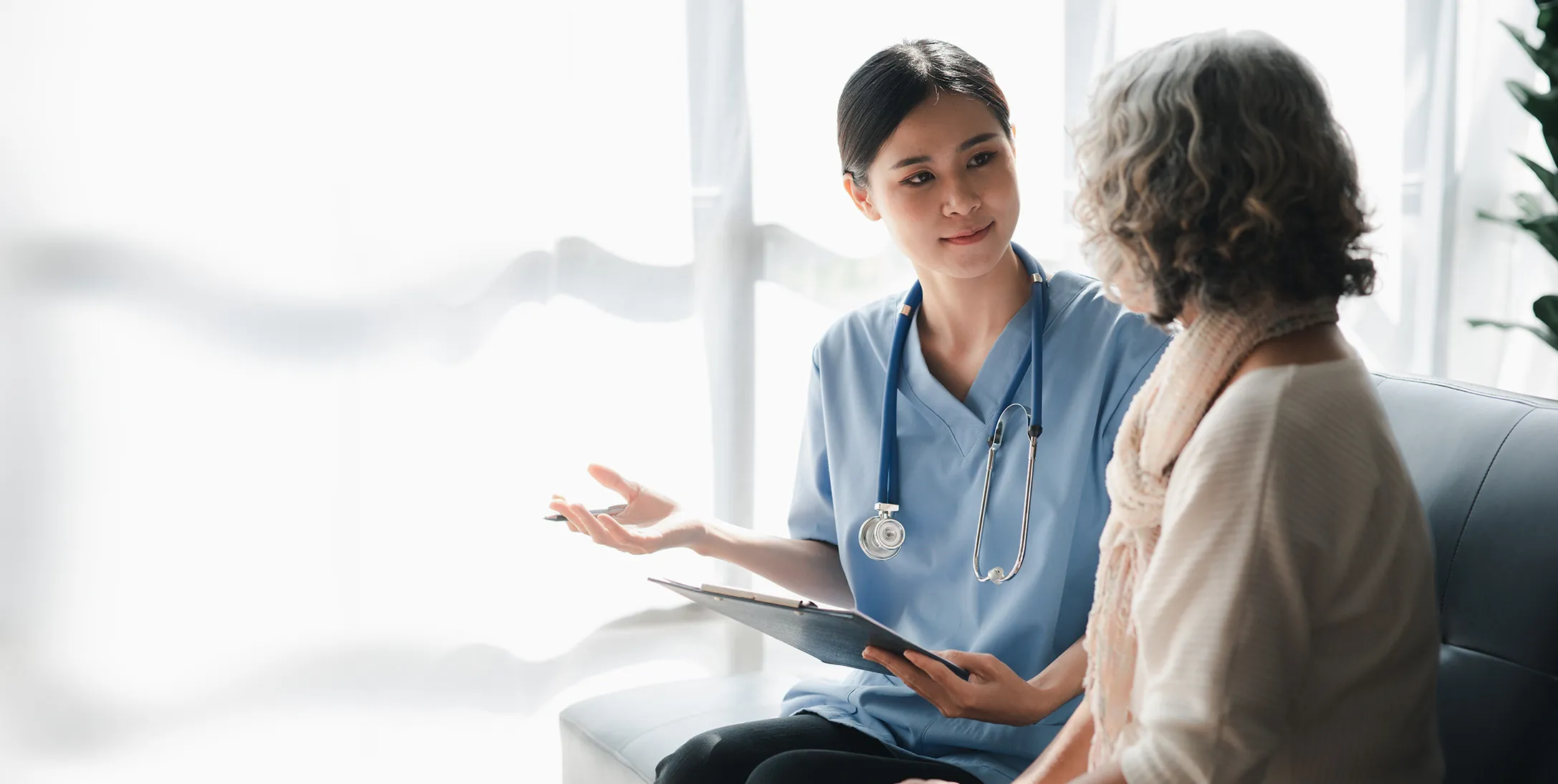 nurse and patient talking
