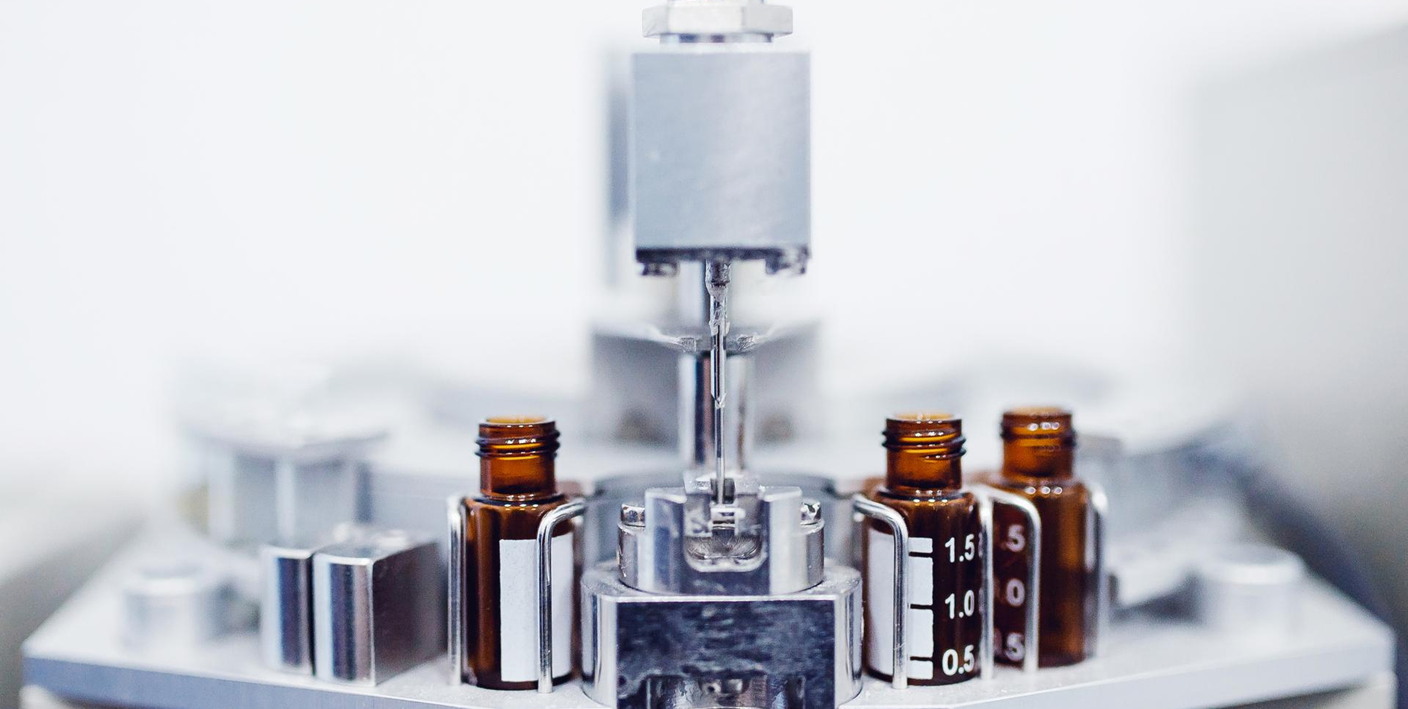 Filling in small medicine bottles