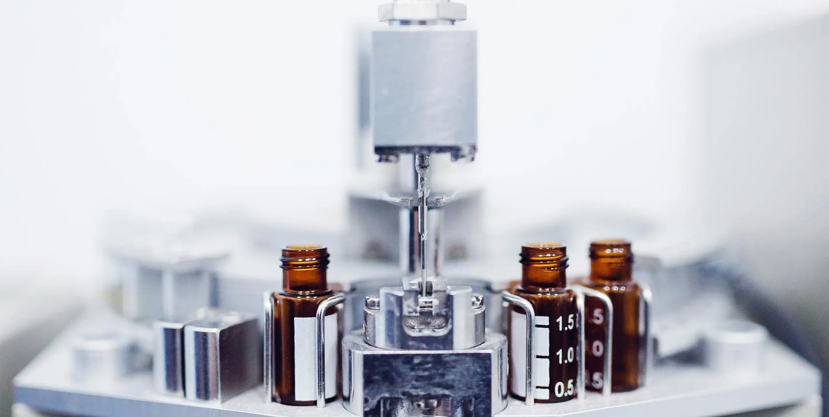 Filling in small medicine bottles