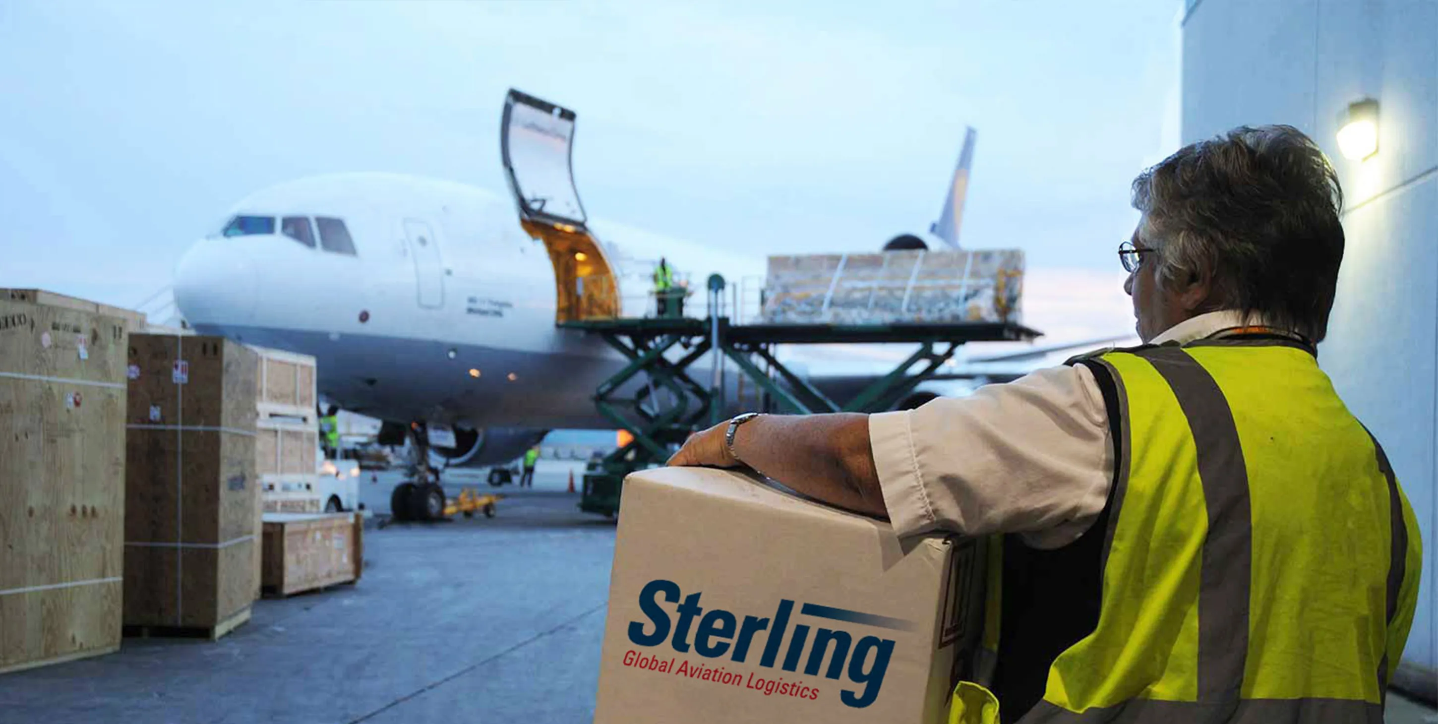 Worker delivering package at the airport