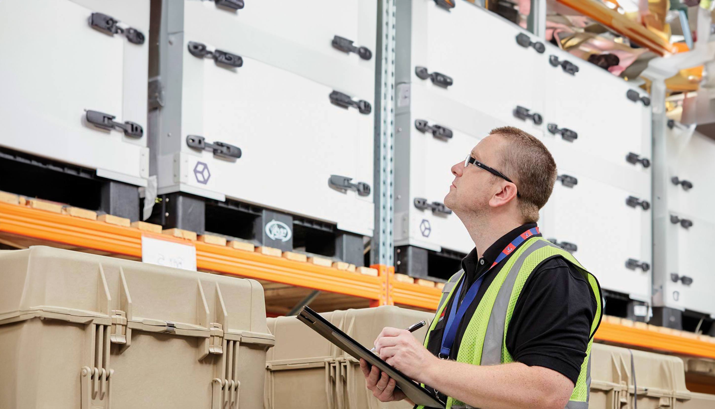 Storage worker checking supplies
