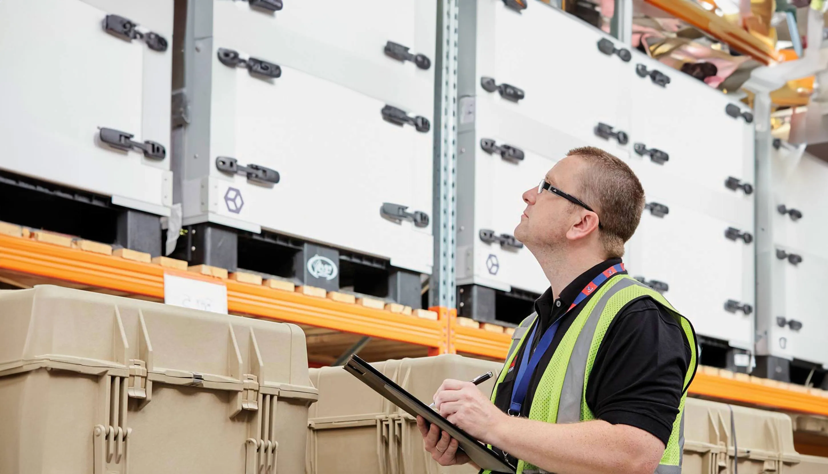 Storage worker checking supplies