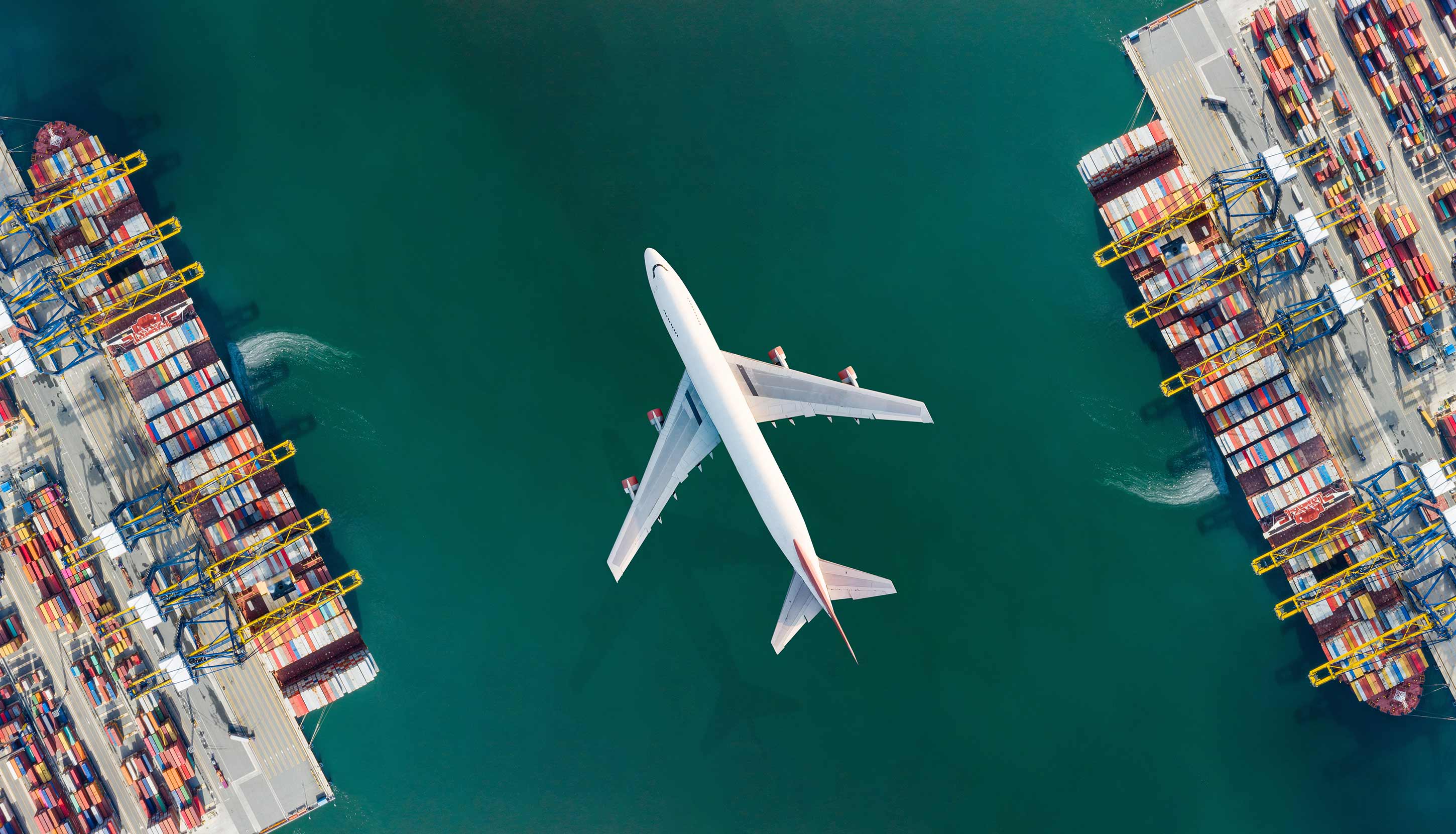 Airplane flying over canal