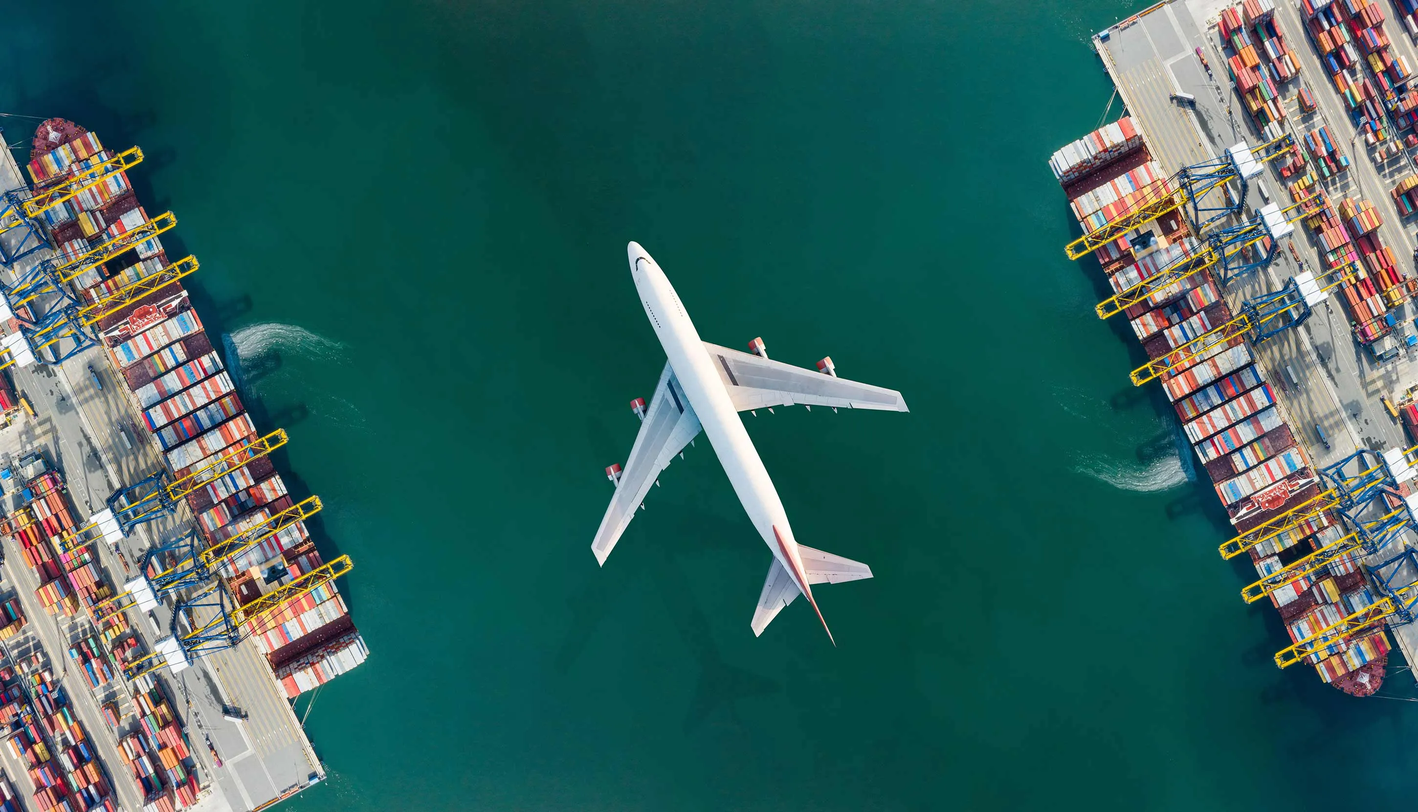 Airplane flying over canal