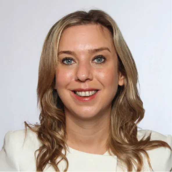Blonde woman with blue eyes smiling
